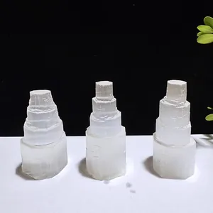 Macro view of three natural white Morocco selenite crystal towers for home decor