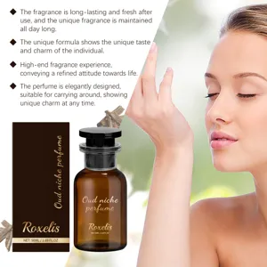 Close-up of Roxelis 50ml Oud niche perfume bottle with dark woody fragrance details