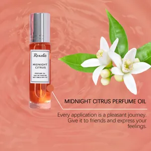 Gedetailleerde macro-opname van Midnight Citrus parfumolie roller met bloemige noten