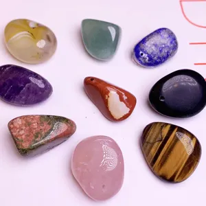 Polished natural crystal tumbled stone pendants with pre-drilled holes for DIY jewelry.