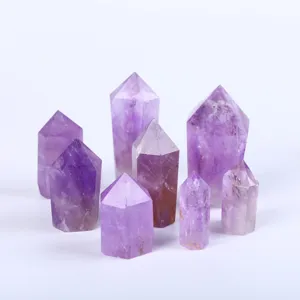 Detailed macro view of natural purple amethyst crystal pillars with six-sided points