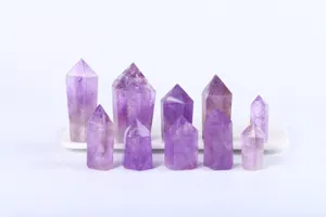 Detailed view of natural amethyst crystal pillars with hexagonal single point tips