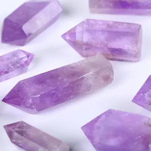 Set of natural hexagonal single-pointed amethyst crystal pillars for home office decor