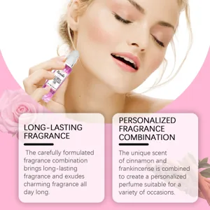 Detailed view of a woman applying long-lasting desert rose flower perfume oil with a rollerball