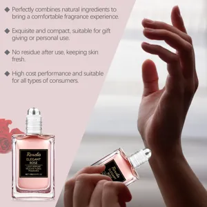 Rollerball rose essential oil perfume being applied to a wrist for daily fragrance.
