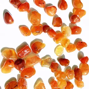 Macro view of polished natural red agate carnelian stones for aquarium and home decor