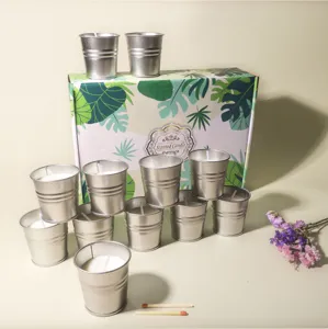 Set de 12 velas perfumadas de citronela en cubos metálicos plateados con caja de regalo
