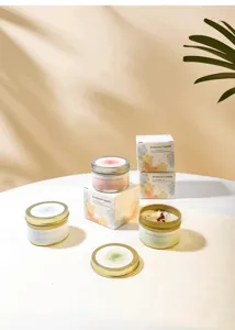 Detailed macro shot of various scented soy wax candles with beautiful packaging