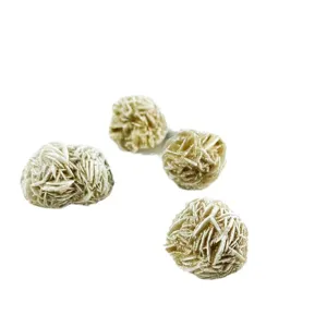 Natural desert rose stone mineral specimens showing organic crystal rose-like clusters