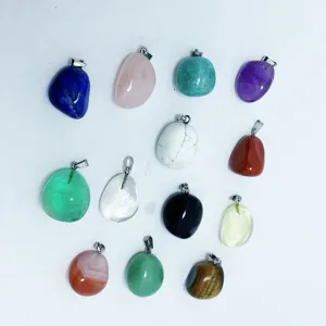 Variety of natural tumbled crystal pendants in multiple colors for DIY jewelry making projects