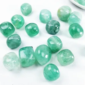 Natural green fluorite tumbled stones, polished mineral specimens for DIY jewelry and decor.