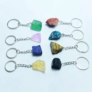 Set of assorted natural crystal raw stone keychains with colorful mineral pendants