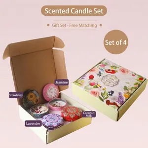 Vista dettagliata del set regalo da 4 pezzi di candele profumate con eleganti motivi floreali
