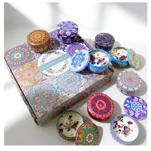 Scented candle gift set with decorative tin cans and dried flower petals in soy wax