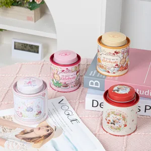 Decorative bunny-themed tin scented candles for birthday gift set in lifestyle setting