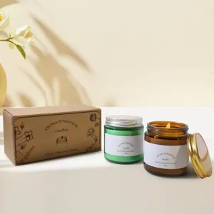 Detailed close-up of premium scented soy wax candles in glass jars with kraft paper gift box