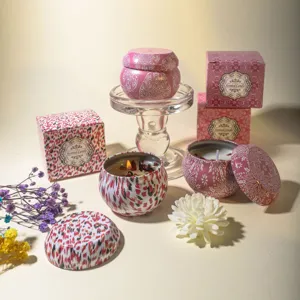 Elegant soy wax scented candle gift set with dried flowers in patterned tin jars