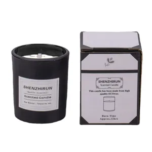 Bougie parfumée minimaliste en verre noir mat avec son emballage cadeau en carton