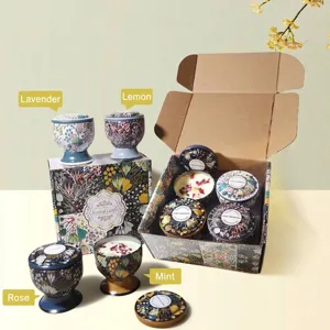 Set regalo di candele profumate con motivi floreali e fiori secchi in barattoli decorativi