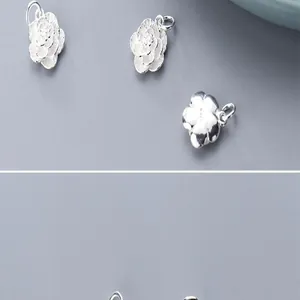 Detailopname van S925 sterling zilveren rozenhangers voor DIY sieraden maken luxe.