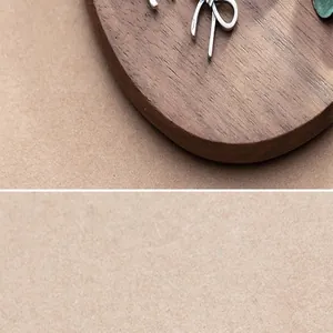 Detailed macro shot of matte S925 sterling silver bow pendant for DIY jewelry craft