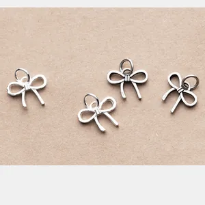 Premium matte S925 sterling silver bow charms for DIY bracelet and necklace jewelry making.
