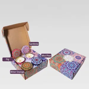 Detalle del set de 4 velas aromáticas con coloridos motivos mandala y caja de regalo