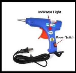 Detail of 20W mini hot glue gun featuring indicator light and manual power switch