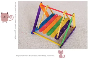 Finished DIY swing project made with colorful wooden popsicle sticks