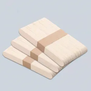 Close-up view of bundled natural birch wood sticks for popsicle crafts and waxing