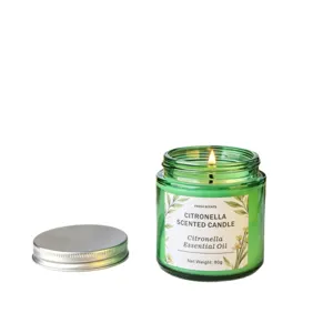 Vela aromática de citronela en tarro de vidrio verde con tapa de metal para exterior 80g