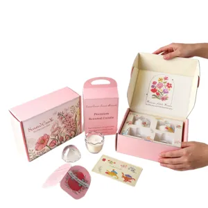 Premium Easter egg-shaped scented candle gift set presented in a pink floral decorative box