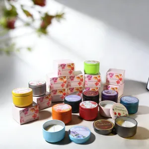 Premium 12-piece floral and fruity soy wax scented candle set in colorful metal gift tins
