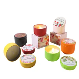 Assorted scented soy wax candles in colorful tins with floral and fruity fragrance gift set