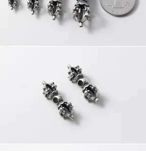 Detailed view of antiqued S925 sterling silver Vajra pestle spacer beads for DIY jewelry