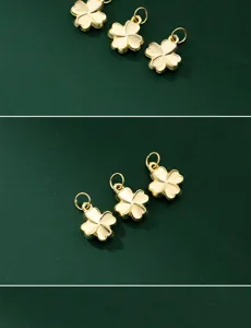 Detail view of gold-plated matte S925 silver four-leaf clover charms for DIY jewelry