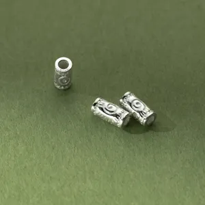 Vintage S925 Thai silver cylindrical spacer beads with etched spiral pattern