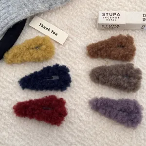Juego de seis pinzas para el cabello de felpa en varios tonos de otoño e invierno