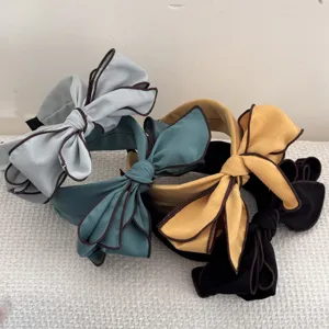 Set di cerchietti vintage con fiocco 3D e bordi a contrasto per donna vari colori