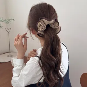 Elegant Korean style ruffled fabric scrunchie in brown and beige for high ponytails