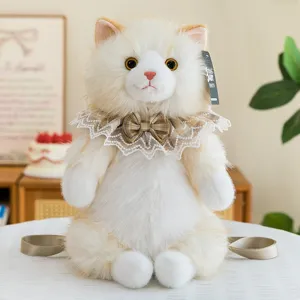 Close-up of fluffy Ragdoll cat plush backpack with lace collar and bow tie detail