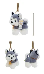 Detailed views of a grey and white plush husky dog keychain with a gold ring and strap