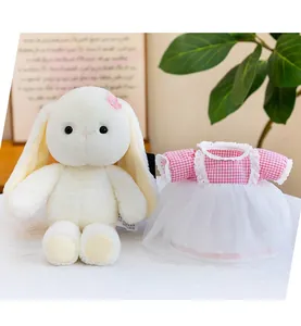 Adorable soft white long-eared plush bunny doll featuring a pink checkered lace dress