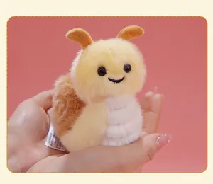 Close-up of a cute yellow plush insect toy with fluffy texture and a friendly face.