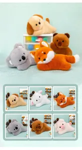 Detailed showcase of plush toy collection including fox, koala, and dog in lying positions