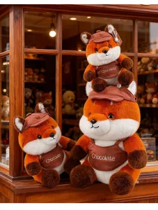 Three Maillard-colored cartoon fox plush toys in various sizes with Chocolate bibs