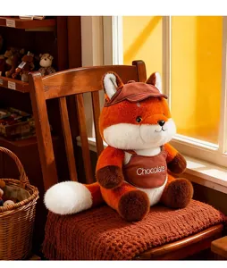 Cute cartoon fox plush toy wearing a 'Chocolate' bib sitting on a chair in warm light