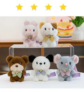 Group of five cute plush animal keychains with colorful polka dot bows