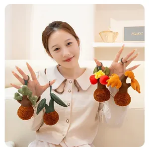 Asian model holding creative plush plant and insect themed keychains for children's gifts