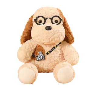 Cute plush puppy toy wearing black-rimmed glasses and a small toy camera accessory